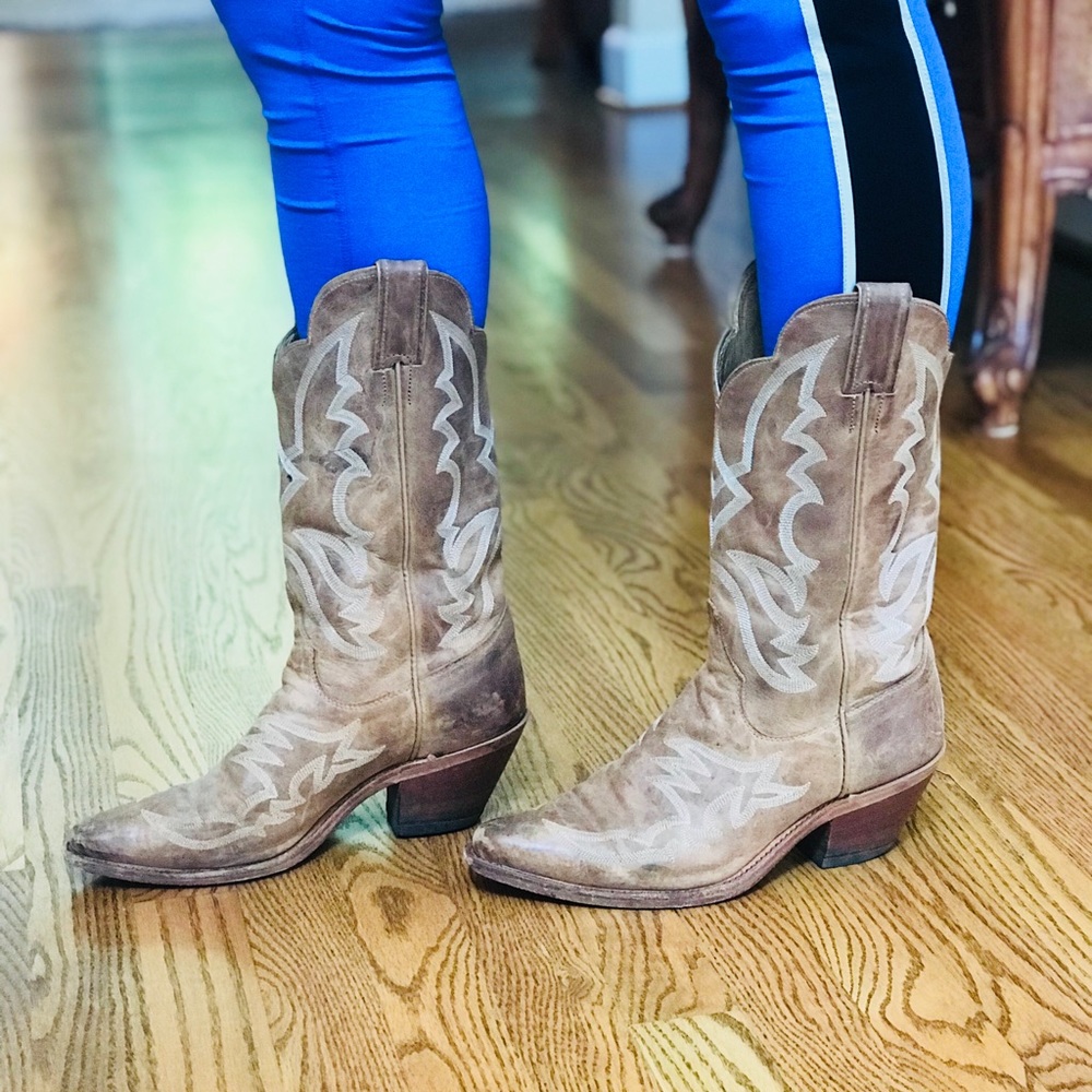 Justin’s tan cowboy boots